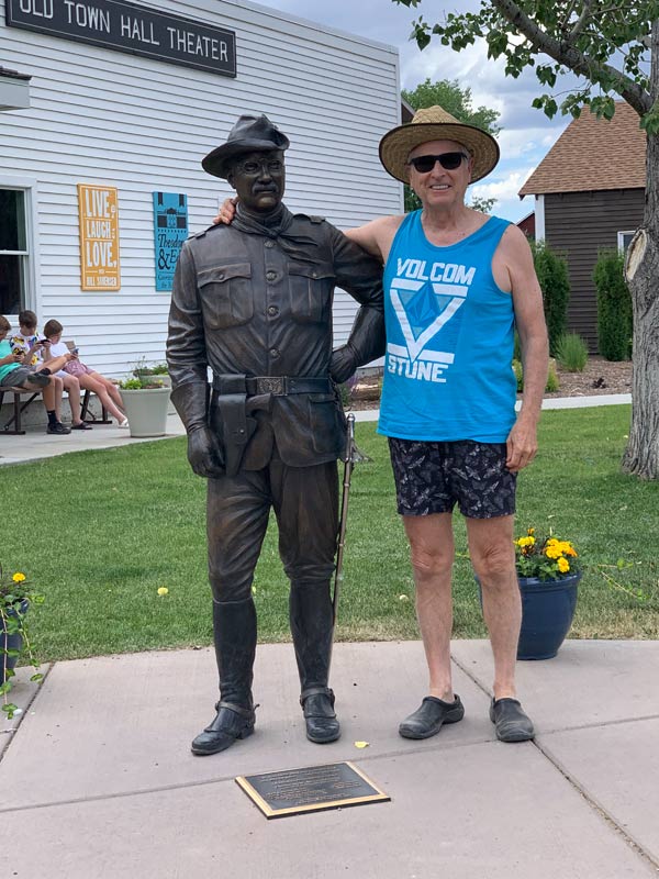 John posing with a statue of Teddy Roosevelt. I’m quite sure given the environmentalist he was he would quite appoove of Sunride.