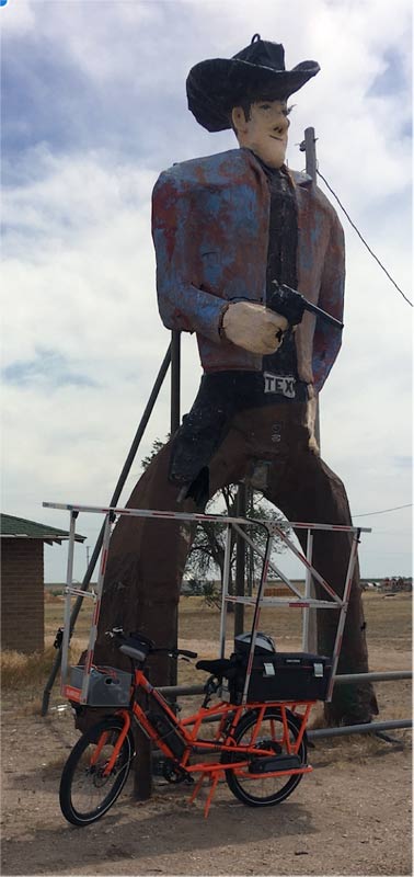20' tall metal cowboy stands guard while I change my flat tire.